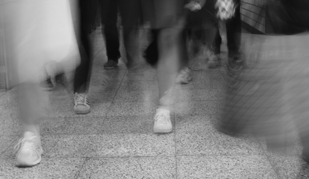Korean commuters during rush hour, reflecting Korea’s fast-paced culture
